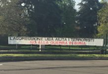 Siria, striscione contro guerra a Milano