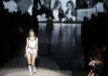 Coronavirus, le grandi firme sfilano a porte chiuse, Armani, D&G e Laura Biagiotti trasmettono in streaming.