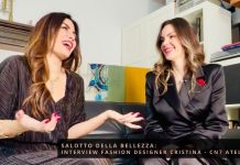 Salotto della Bellezza: Raffaella Manetta intervista Atelier CN7 Moda Nel mondo del design, dove creatività e innovazione si intrecciano per dar vita a opere straordinarie, emerge Georgiana Cristina, una designer di straordinario talento la cui visione ha catturato l'attenzione internazionale. Grazie a una meticolosa cura dei dettagli e a un cuore colmo di passione, Georgiana trasforma le idee in realtà, sfidando le convenzioni e ampliando i confini dell'immaginazione. In questo nuovo episodio di Salotto della Bellezza, esploreremo il suo percorso artistico, scopriremo le fonti di ispirazione che alimentano il suo lavoro e ci immergeremo nella passione che anima le sue creazioni. Cosa ti ha ispirato a intraprendere una carriera nel mondo del design? Fin da piccola, sono stata immersa nell'atmosfera della sartoria, poiché mia madre era sarta in Romania, in un paese affacciato sul Mar Nero, con una clientela affezionata. Ricordo con vividezza le sue lunghe ore dedicate alla creazione di abiti da cerimonia e da sposa. Ero “ipnotizzata” dai tessuti e passavo intere giornate ad osservare come tagliava, sperando di ottenere dei ritagli per creare vestiti per le mie bambole. Così, ogni volta che mia madre liberava lo spazio dalla macchina da cucire, mi mettevo all'opera… che bei ricordi. Con il passare degli anni, il destino mi ha portato a Milano, dove ho iniziato gli studi in moda, design, modellistica, merceologia e tecniche di sartoria. Ho continuato a seguire con determinazione questo percorso. Puoi parlarci del tuo processo creativo e di come sviluppi una nuova collezione? Per creare, è fondamentale sognare. Immagino linee, colori e volumi per la donna elegante. Un abito elegante esprime una raffinata unicità. Nel progettare nuove collezioni, seguo le tendenze della moda, reinterpretando uno stile classico in chiave moderna. Leggo e svolgo ricerche approfondite sui libri di moda Esploro una varietà di tessuti Realizzo schizzi delle mie idee Questo processo richiede settimane: inizio con un'idea e mi impegno a trasformarla nella sua migliore espressione, mantenendo sempre un “occhio critico”. Quali sono le sfide più grandi che hai affrontato nel tuo percorso professionale e come le hai superate? Fino ad ora, ho affrontato tre grandi e significative sfide: Definire e mantenere la propria identità: Chi sono io, Cristina, come stilista? Instabilità economica: Creare e realizzare un capo di qualità richiede un investimento significativo, spesso superiore ai guadagni iniziali. All’inizio, si lavora intensamente per ottenere risultati limitati. Visibilità e marketing: Oggi non basta essere bravi; è fondamentale saper comunicare sui social media, adattandosi alle nuove tecnologie. È essenziale costruire un’immagine forte e sapersi vendere. Molti stilisti, me compresa, affrontano difficoltà in questo ambito. È cruciale far percepire al pubblico la qualità offerta, che deve sempre riflettersi nel prezzo. C’e un progetto specifico di cui sei particolarmente orgogliosa? Se si, quale e perché? Ogni progetto che ho realizzato nel corso della mia carriera è stato gratificante, ma ce ne sono due che occupano un posto speciale nel mio cuore: Il primo è stato quando mi è stato richiesto di realizzare un abito da cerimonia su misura per una cliente in cerca di eleganza. Durante il processo, ho collaborato attentamente con lei, ascoltando le sue idee e interpretando la sua personalità per creare l'abito ideale. Quando ho visto il suo sguardo felice e radioso, accompagnato da un sincero “Grazie”, ho percepito quel momento come un grande traguardo personale. Il secondo è stato il Fashion Show dell'Atelier CN7 Moda, che si è tenuto durante l'evento Milano Fashion Luxury Trip. Questa esperienza ha portato grande soddisfazione, visibilità e un'emozione indimenticabile in quella giornata. Quali trend vedi emergere nel mondo del design e come pensi di integrarle nel tuo lavoro? Nel settore della moda si stanno delineando alcuni trend molto evidenti: Sostenibilità Reale (non solo marketing) Tessuti naturali (lino, seta, cotone) Produzione lenta e limitata Estetica Minimal ma Sofisticata Linee pulite Silhouette eleganti Palette distintive per ogni mini-collezione Tecnologia Software di design 3D Prototipi digitali Identità Culturale e Storytelling Oggi, i brand di successo hanno una storia riconoscibile Molti designer integrano radici culturali, artigianato o simboli personali. Per creare un prodotto di Atelier CN7 Moda, seguo questi trend per rimanere al passo, ma riesco anche a integrarli in modo personalizzato. Ad esempio, scelgo pochi materiali di alta qualità, creo capsule collection piccole ma curate, sviluppo collezioni digitali, realizzo capi che durano nel tempo, creo pezzi iconici e utilizzo tecniche artigianali. Racconto una storia dietro ogni capsule collection o collezione intera; questo aumenta il valore percepito del brand e costruisce un universo estetico coerente per Atelier CN7 Moda. Quali sono i materiali e le tecniche che preferisci utilizzare nei tuoi progetti? In un brand di alta sartoria Made in Italy, la selezione dei tessuti è cruciale, in quanto determina: Qualità, caduta del capo, confort, eleganza, prestigio I materiali più utilizzati includono: Seta luminosa (come georgette, chiffon, lurex e crepe de chine) per abiti da sera e come fodere di lusso Tessuti Chanel per giacche in vari colori e consistenze Lana e tweed Duchesse e shantung di seta Taffetà cangiante Pizzi di diversi tipi Per le capsule estive, prediligo tessuti meno impegnativi ma altrettanto splendidi, come la viscosa e il cotone sangallo. Le tecniche utilizzate restano sempre di alta sartoria. Come si è evoluto il tuo stile negli anni e quali sono stati i fattori chiave che hanno influenzato questa evoluzione? All’inizio del mio percorso, il mio approccio era prevalentemente focalizzato su un’estetica tradizionale. Tuttavia, con il passare del tempo, ho evoluto il mio stile verso una direzione più contemporanea e sofisticata, mantenendo alta la qualità e introducendo proporzioni più moderne. I fattori chiave che hanno influenzato questa evoluzione sono stati: l’esperienza diretta con i clienti, l’evoluzione della moda, la mia ricerca personale e creativa. Che consiglio daresti a chi desidera iniziare una carriera nel design? Il primo consiglio che vorrei dare è di costruire una solida identità creativa, ma è altrettanto essenziale rimanere aperti e impegnarsi in un costante processo di apprendimento. Perseveranza: È fondamentale perseverare e dedicarsi a molta pratica. Sperimentazione: Provate a realizzare piccoli progetti e, soprattutto, non abbiate paura di fare errori; sono imprescindibili per la crescita. Un ultimo consiglio, probabilmente il più rilevante, è quello di studiare le basi della sartoria, della merceologia e delle tecniche di costruzione dei capi. Questo apprendimento dovrebbe procedere di pari passo con il tessuto scelto e le linee progettate, poiché molte variabili possono cambiare. È cruciale saper adattare ogni modifica sartoriale al capo in fase di produzione. Un ringraziamento speciale a Cristina per aver condiviso con noi la tua straordinaria visione e per averci ispirato con il tuo talento. Siamo entusiasti di scoprire dove ti porterà il tuo percorso creativo e non vediamo l’ora di ammirare le tue future collezioni. Ci vediamo nel prossimo episodio; restate sintonizzati! Grazie per il tuo impegno instancabile e per aver ispirato tante donne a credere nelle proprie capacità e a unirsi per un futuro migliore. La tua presenza oggi ha arricchito il nostro programma e ci ha ricordato il potere della solidarietà e del sostegno reciproco. Vi invitiamo tutti a continuare a seguire e supportare questo straordinario movimento. Grazie per essere stati con noi nel Salotto della Bellezza. Vi aspettiamo per nuovi incontri e storie straordinarie che ci aiuteranno a vedere il mondo con occhi nuovi! Il Format Salotto della Bellezza Ogni episodio di Salotto della Bellezza offre un’opportunità unica per connettersi con figure di spicco che hanno saputo reinventarsi, superare sfide e lasciare un’impronta indelebile nei loro settori. Con interviste coinvolgenti e momenti di profonda riflessione, gli spettatori saranno trasportati in un mondo dove creatività e determinazione si uniscono, dimostrando che il cambiamento è non solo possibile, ma anche un’avventura straordinaria da affrontare con coraggio e passione.