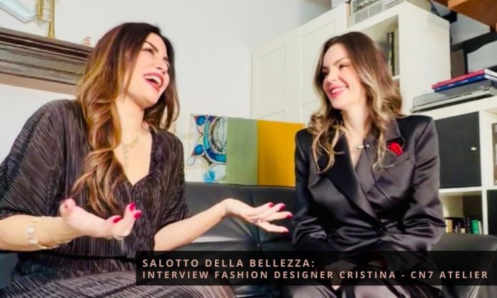 Salotto della Bellezza_ Interview Fashion Designer Cristina - CN7 Atelier Nel mondo del design, dove creatività e innovazione si intrecciano per dar vita a opere straordinarie, emerge Georgiana Cristina, una designer di straordinario talento la cui visione ha catturato l'attenzione internazionale. Grazie a una meticolosa cura dei dettagli e a un cuore colmo di passione, Georgiana trasforma le idee in realtà, sfidando le convenzioni e ampliando i confini dell'immaginazione. In questo nuovo episodio di Salotto della Bellezza, esploreremo il suo percorso artistico, scopriremo le fonti di ispirazione che alimentano il suo lavoro e ci immergeremo nella passione che anima le sue creazioni. Cosa ti ha ispirato a intraprendere una carriera nel mondo del design? Fin da piccola, sono stata immersa nell'atmosfera della sartoria, poiché mia madre era sarta in Romania, in un paese affacciato sul Mar Nero, con una clientela affezionata. Ricordo con vividezza le sue lunghe ore dedicate alla creazione di abiti da cerimonia e da sposa. Ero “ipnotizzata” dai tessuti e passavo intere giornate ad osservare come tagliava, sperando di ottenere dei ritagli per creare vestiti per le mie bambole. Così, ogni volta che mia madre liberava lo spazio dalla macchina da cucire, mi mettevo all'opera… che bei ricordi. Con il passare degli anni, il destino mi ha portato a Milano, dove ho iniziato gli studi in moda, design, modellistica, merceologia e tecniche di sartoria. Ho continuato a seguire con determinazione questo percorso. Puoi parlarci del tuo processo creativo e di come sviluppi una nuova collezione? Per creare, è fondamentale sognare. Immagino linee, colori e volumi per la donna elegante. Un abito elegante esprime una raffinata unicità. Nel progettare nuove collezioni, seguo le tendenze della moda, reinterpretando uno stile classico in chiave moderna. Leggo e svolgo ricerche approfondite sui libri di moda Esploro una varietà di tessuti Realizzo schizzi delle mie idee Questo processo richiede settimane: inizio con un'idea e mi impegno a trasformarla nella sua migliore espressione, mantenendo sempre un “occhio critico”. Quali sono le sfide più grandi che hai affrontato nel tuo percorso professionale e come le hai superate? Fino ad ora, ho affrontato tre grandi e significative sfide: Definire e mantenere la propria identità: Chi sono io, Cristina, come stilista? Instabilità economica: Creare e realizzare un capo di qualità richiede un investimento significativo, spesso superiore ai guadagni iniziali. All’inizio, si lavora intensamente per ottenere risultati limitati. Visibilità e marketing: Oggi non basta essere bravi; è fondamentale saper comunicare sui social media, adattandosi alle nuove tecnologie. È essenziale costruire un’immagine forte e sapersi vendere. Molti stilisti, me compresa, affrontano difficoltà in questo ambito. È cruciale far percepire al pubblico la qualità offerta, che deve sempre riflettersi nel prezzo. C’e un progetto specifico di cui sei particolarmente orgogliosa? Se si, quale e perché? Ogni progetto che ho realizzato nel corso della mia carriera è stato gratificante, ma ce ne sono due che occupano un posto speciale nel mio cuore: Il primo è stato quando mi è stato richiesto di realizzare un abito da cerimonia su misura per una cliente in cerca di eleganza. Durante il processo, ho collaborato attentamente con lei, ascoltando le sue idee e interpretando la sua personalità per creare l'abito ideale. Quando ho visto il suo sguardo felice e radioso, accompagnato da un sincero “Grazie”, ho percepito quel momento come un grande traguardo personale. Il secondo è stato il Fashion Show dell'Atelier CN7 Moda, che si è tenuto durante l'evento Milano Fashion Luxury Trip. Questa esperienza ha portato grande soddisfazione, visibilità e un'emozione indimenticabile in quella giornata. Quali trend vedi emergere nel mondo del design e come pensi di integrarle nel tuo lavoro? Nel settore della moda si stanno delineando alcuni trend molto evidenti: Sostenibilità Reale (non solo marketing) Tessuti naturali (lino, seta, cotone) Produzione lenta e limitata Estetica Minimal ma Sofisticata Linee pulite Silhouette eleganti Palette distintive per ogni mini-collezione Tecnologia Software di design 3D Prototipi digitali Identità Culturale e Storytelling Oggi, i brand di successo hanno una storia riconoscibile Molti designer integrano radici culturali, artigianato o simboli personali. Per creare un prodotto di Atelier CN7 Moda, seguo questi trend per rimanere al passo, ma riesco anche a integrarli in modo personalizzato. Ad esempio, scelgo pochi materiali di alta qualità, creo capsule collection piccole ma curate, sviluppo collezioni digitali, realizzo capi che durano nel tempo, creo pezzi iconici e utilizzo tecniche artigianali. Racconto una storia dietro ogni capsule collection o collezione intera; questo aumenta il valore percepito del brand e costruisce un universo estetico coerente per Atelier CN7 Moda. Quali sono i materiali e le tecniche che preferisci utilizzare nei tuoi progetti? In un brand di alta sartoria Made in Italy, la selezione dei tessuti è cruciale, in quanto determina: Qualità, caduta del capo, confort, eleganza, prestigio I materiali più utilizzati includono: Seta luminosa (come georgette, chiffon, lurex e crepe de chine) per abiti da sera e come fodere di lusso Tessuti Chanel per giacche in vari colori e consistenze Lana e tweed Duchesse e shantung di seta Taffetà cangiante Pizzi di diversi tipi Per le capsule estive, prediligo tessuti meno impegnativi ma altrettanto splendidi, come la viscosa e il cotone sangallo. Le tecniche utilizzate restano sempre di alta sartoria. Come si è evoluto il tuo stile negli anni e quali sono stati i fattori chiave che hanno influenzato questa evoluzione? All’inizio del mio percorso, il mio approccio era prevalentemente focalizzato su un’estetica tradizionale. Tuttavia, con il passare del tempo, ho evoluto il mio stile verso una direzione più contemporanea e sofisticata, mantenendo alta la qualità e introducendo proporzioni più moderne. I fattori chiave che hanno influenzato questa evoluzione sono stati: l’esperienza diretta con i clienti, l’evoluzione della moda, la mia ricerca personale e creativa. Che consiglio daresti a chi desidera iniziare una carriera nel design? Il primo consiglio che vorrei dare è di costruire una solida identità creativa, ma è altrettanto essenziale rimanere aperti e impegnarsi in un costante processo di apprendimento. Perseveranza: È fondamentale perseverare e dedicarsi a molta pratica. Sperimentazione: Provate a realizzare piccoli progetti e, soprattutto, non abbiate paura di fare errori; sono imprescindibili per la crescita. Un ultimo consiglio, probabilmente il più rilevante, è quello di studiare le basi della sartoria, della merceologia e delle tecniche di costruzione dei capi. Questo apprendimento dovrebbe procedere di pari passo con il tessuto scelto e le linee progettate, poiché molte variabili possono cambiare. È cruciale saper adattare ogni modifica sartoriale al capo in fase di produzione. Un ringraziamento speciale a Cristina per aver condiviso con noi la tua straordinaria visione e per averci ispirato con il tuo talento. Siamo entusiasti di scoprire dove ti porterà il tuo percorso creativo e non vediamo l’ora di ammirare le tue future collezioni. Ci vediamo nel prossimo episodio; restate sintonizzati! Grazie per il tuo impegno instancabile e per aver ispirato tante donne a credere nelle proprie capacità e a unirsi per un futuro migliore. La tua presenza oggi ha arricchito il nostro programma e ci ha ricordato il potere della solidarietà e del sostegno reciproco. Vi invitiamo tutti a continuare a seguire e supportare questo straordinario movimento. Grazie per essere stati con noi nel Salotto della Bellezza. Vi aspettiamo per nuovi incontri e storie straordinarie che ci aiuteranno a vedere il mondo con occhi nuovi! Il Format Salotto della Bellezza Ogni episodio di Salotto della Bellezza offre un’opportunità unica per connettersi con figure di spicco che hanno saputo reinventarsi, superare sfide e lasciare un’impronta indelebile nei loro settori. Con interviste coinvolgenti e momenti di profonda riflessione, gli spettatori saranno trasportati in un mondo dove creatività e determinazione si uniscono, dimostrando che il cambiamento è non solo possibile, ma anche un’avventura straordinaria da affrontare con coraggio e passione.