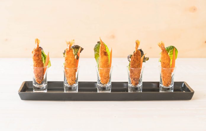 batter-fried prawns on wood